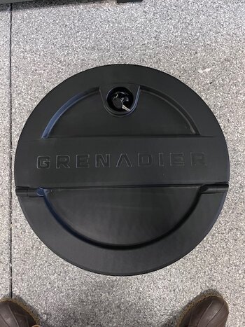 Factory OEM lockable spare tire storage, New Takeoff