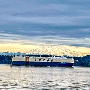 Morning Cantor entering the port of Tacoma w Mt Rainier in background.jpg